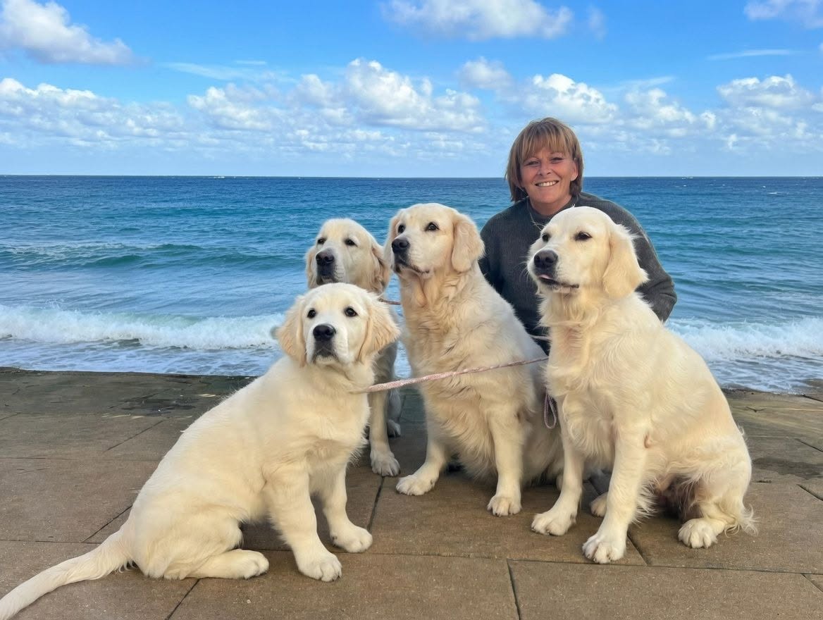 Lesley and Strathlon Goldens on the Isle of Man shore